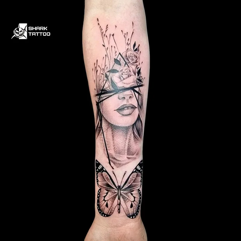 face and flowers tattoo